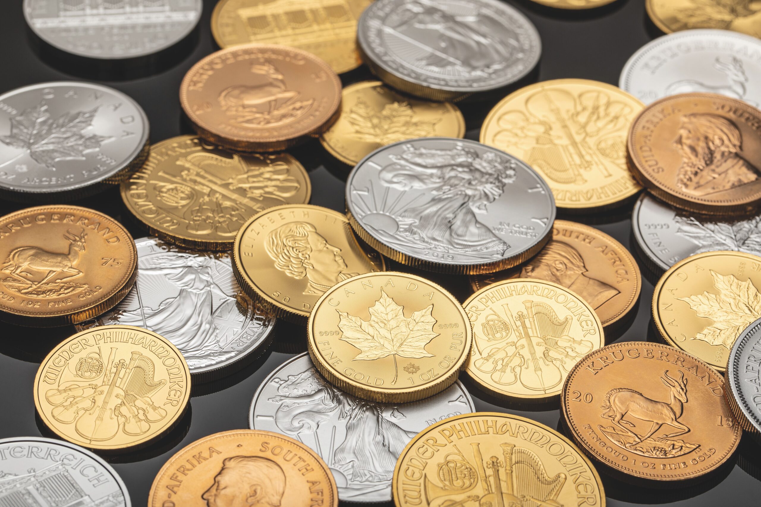Antique coins arranged to explain coin mintage and scarcity