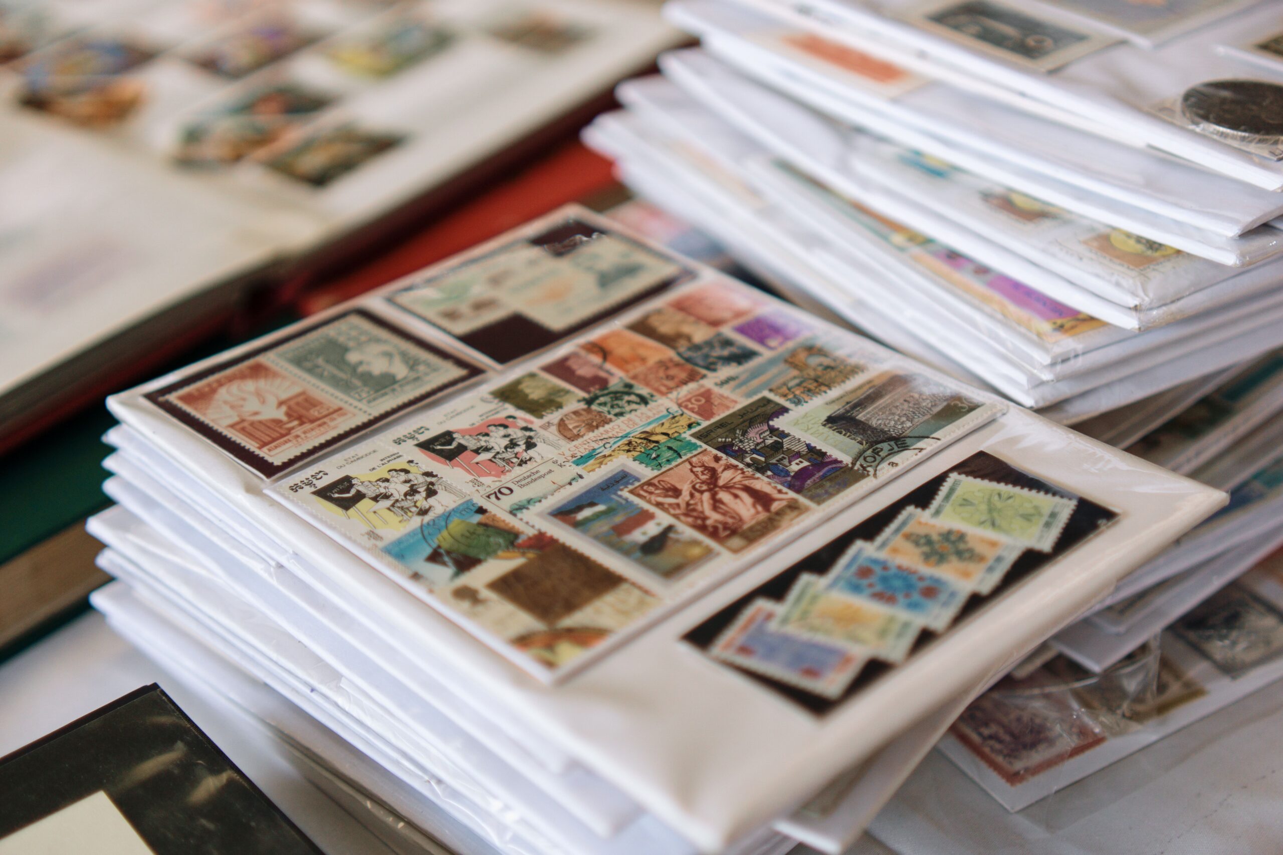 Vintage postage stamps organized in an album