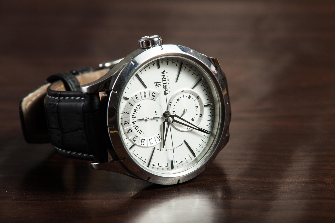 Close-up of a luxury wristwatch on display showing craftsmanship and detail