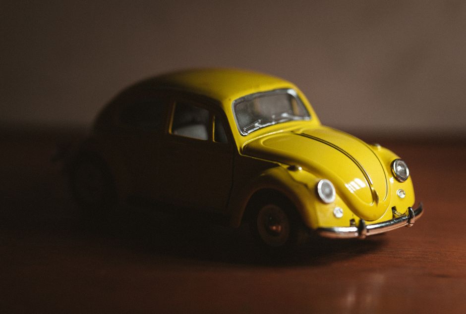 Detailed miniature yellow vintage Beetle die-cast car
