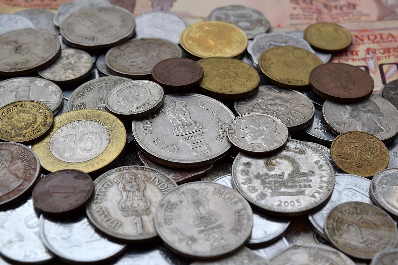 How to Choose a First Coin Show and Prepare Questions for Dealers 2 Personal coin collection in folders
