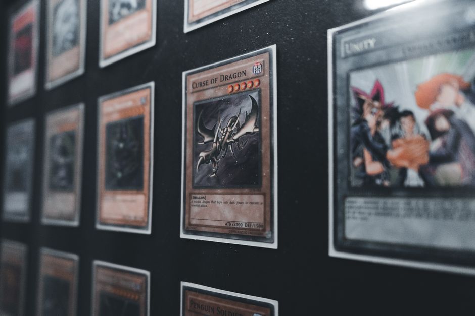 Yu-Gi-Oh trading cards in a display case showing rare collectible cards